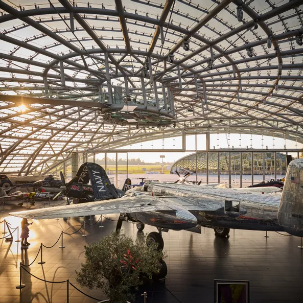 Interior view of Hangar-7 showing its glass-and-steel architecture and exhibits in the exhibition
